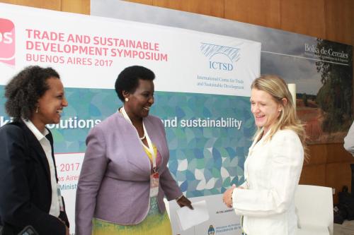 Kyambadde_sharing_a_light_moment_with_officials_from_International_Centre_for_Trade__Sustainable_Devt_after_the_symposium